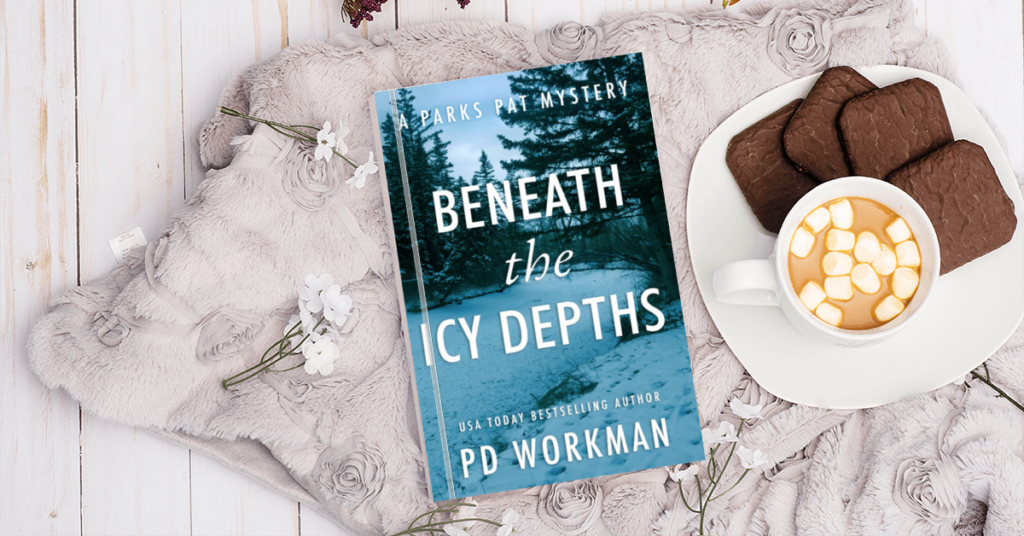 Beneath the Icy Depths book with hot chocolate and gingerbread