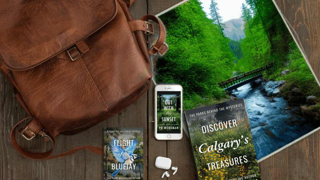 contents of parks pat survival pack spread out on a rustic table with a satchel police procedural mysteries set in picturesque canada