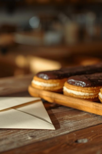 bakery cozy eclairs and mysterious envelope
