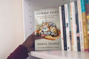 hand removes talmage tales from nursery shelves