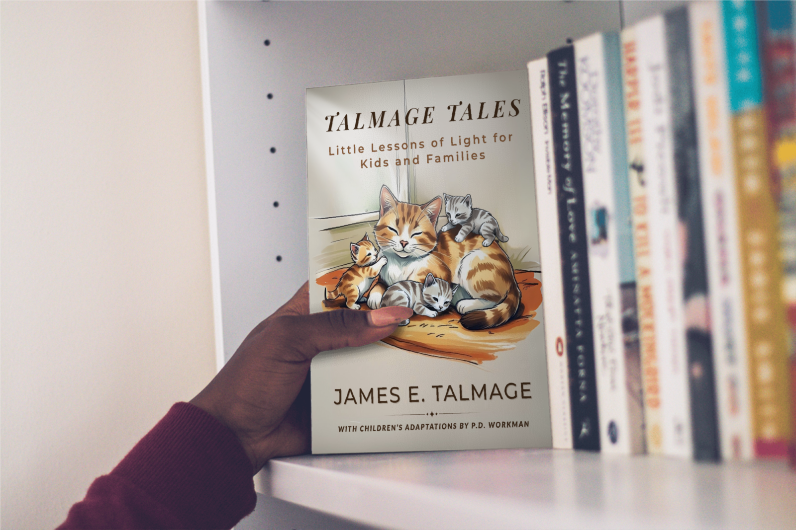 Hand removes Talmage Tales from nursery shelf