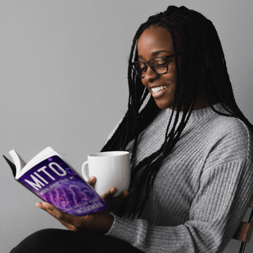 woman reading a book and smiling